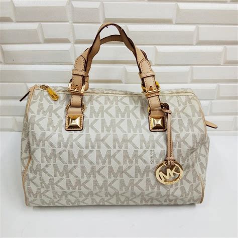 fake michael kors websites|michael kors knockoff wallets.